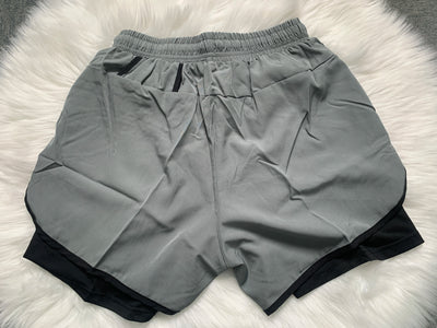 Shorts esportivos casuais anti-exposição de camada dupla masculinos, mais vendidos no verão, para corrida, fitness, calças três quartos