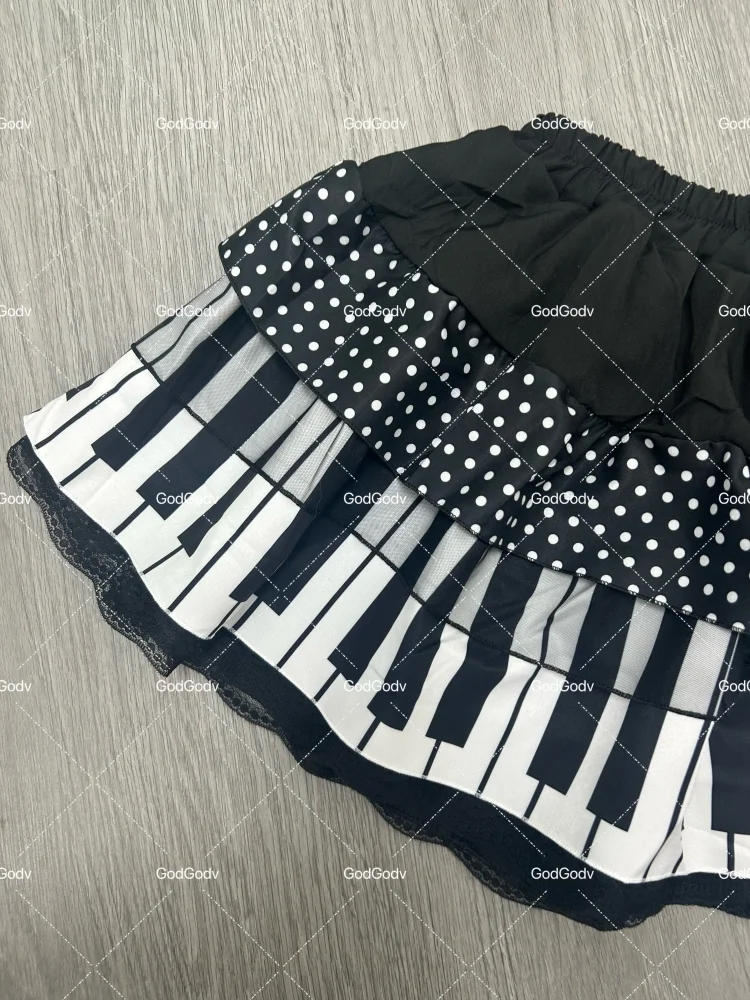 Saia curta feminina primavera preto e branco emendada 2025 Y2K design fino Harajuku mini saia feminina estilo império coreano chique saia piano