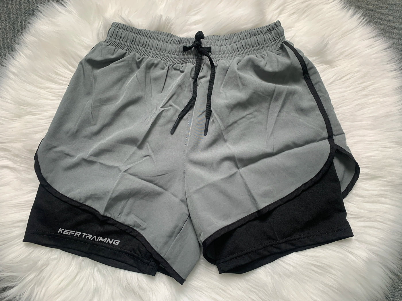 Shorts esportivos casuais anti-exposição de camada dupla masculinos, mais vendidos no verão, para corrida, fitness, calças três quartos